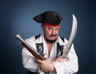 pirate with a chest with a knife and a gun