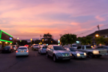 Fototapeta premium blur of colorful sky in twilight time above car park