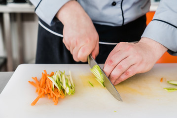 chef cutting vegetables