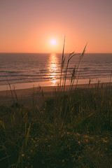 Naklejka premium Sonnenuntergang am Strand