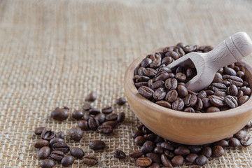 Fototapeta na wymiar Coffee beans on the rough burlap