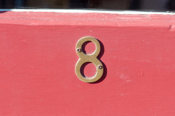 House number 8 sign