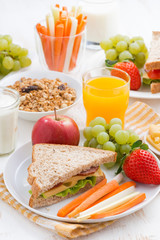 healthy school breakfast with fruits and vegetables, vertical