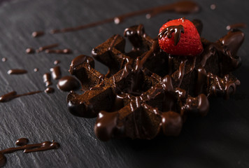 Chocolate waffles with chocolate sauce 
