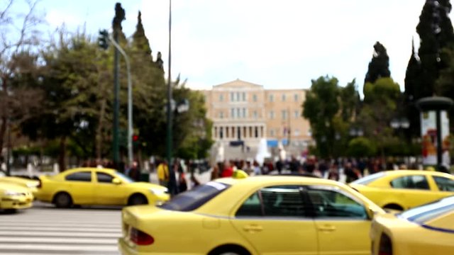 people crossing road on Syntagma square in Athens, Greece, Europe