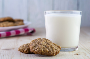 Oatmeal cookies and milk glass
