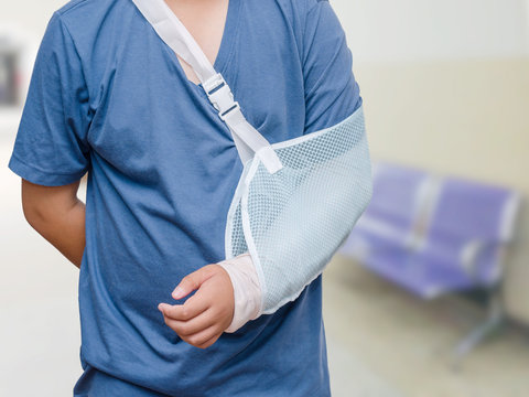 Asian boy with broken arm at hospital