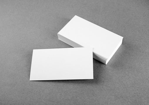 Blank business cards template on gray background. Mockup for branding identity  for designers. Black and white image.