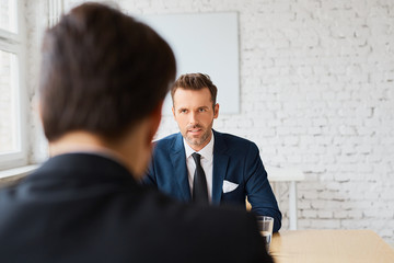 Job interview - recruiter negotiate terms with candidate