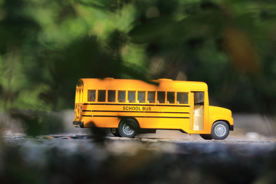 Yellow school bus toy model.