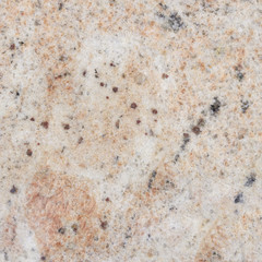 Beige granite texture with natural pattern.