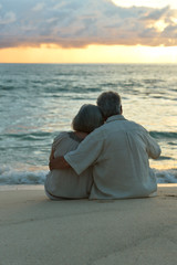 Fototapeta premium elderly couple rest at tropical beach