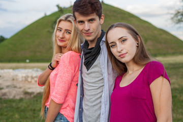 Great sunny day with best friends in park. Positive emotions.