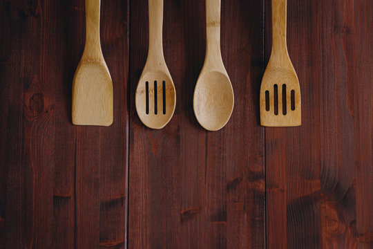 Wooden spoons in a row