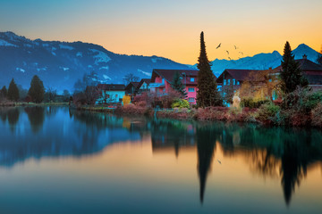 Beautiful view of the river and the house to Interlaken, Switzerland - obrazy, fototapety, plakaty