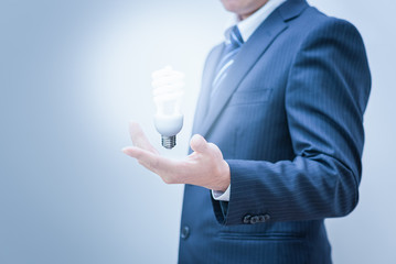 Business man with empty hand. Hand Holding a Light