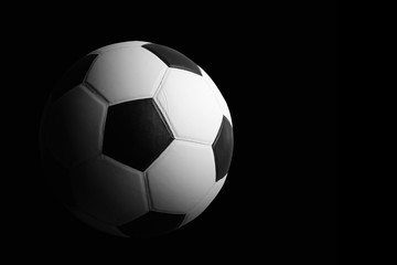 Fototapeta na wymiar soccer ball detail on black background...