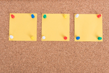 Yellow blank note papers with pin