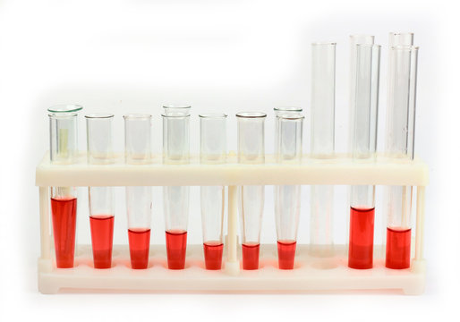 Chemical glassware test tubes with red liquids