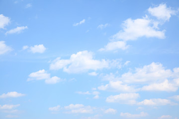 Naklejka na ściany i meble Light blue sky with clouds