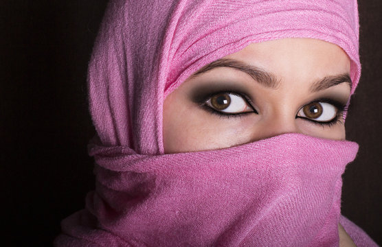 close-up beautiful mysterious eyes eastern woman wearing a hijab