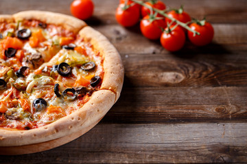 Vegeterian pizza with mushrooms and olives