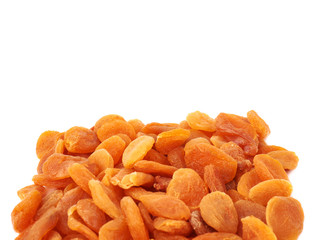 Dried orange apricots over white background