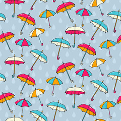 Seamless pattern with umbrellas. Vector illustration.