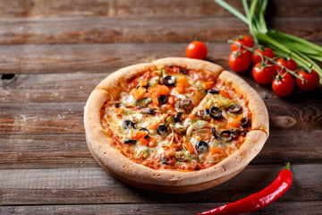 Pizza with tomato, mushroom and olives