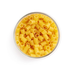 Glass jar filled with dry ditalini pasta over isolated white background