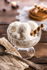 Vanilla ice cream with waffle in ramekin