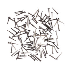 Scattered nails over surface isolated over white background