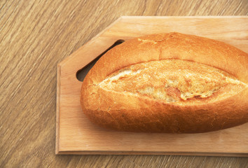 Fresh bread on a wooden table