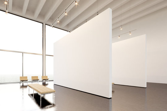 Picture exposition modern gallery,open space.Huge white empty canvas hanging contemporary art museum.Interior industrial style with concrete floor, spotlight, generic design furniture. 3d rendering