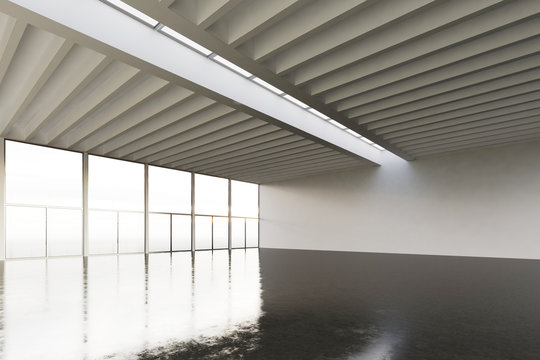 Photo of huge empty expo hangar in modern building.Interior loft style with concrete floor,panoramic windows.Abstract background,blank walls. Ready for business info.Horizontal mockup.3d rendering