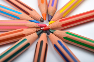 Fototapeta premium Close up picture of colored pencil crayons with stripes arranged
