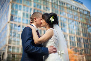 Fototapeta premium gorgeous, happy, beautiful couple in the botanical garden, weddi