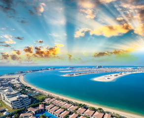 Sunset over Dubai Jumeirah Palm, aerial view