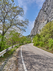 asphalt road in rocks