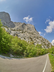 asphalt road in rocks