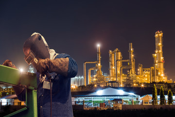 Industrial Worker at the factory welding