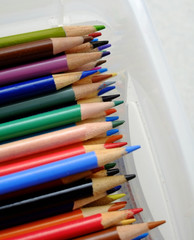Tin Bin of Colored Pencils Representing Art