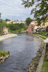 Fototapeta na wymiar Background cityscape view of the Vltava River and the house on the banks of Ceske Krumlov, Czech Republic