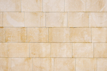 Beige granite wall background texture