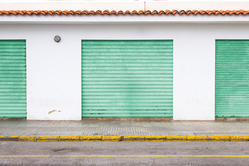 Industrial retro wall with coloured garages in spanish style