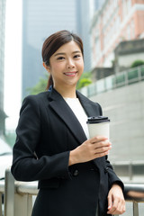 Businesswoman hold with coffee cup