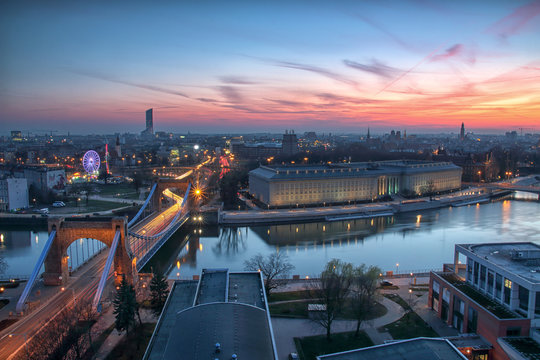 WROCLAW, POLAND - APRIL 02, 2016: Aerial view of Wroclaw. Illuminated city skyline during a beautiful sunset, April 02, 2016 in Wroclaw, Poland.