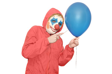 Clown in a red jacket