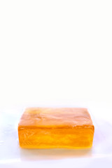 Orange Bar of Glycerin Soap Isolated on White Background
