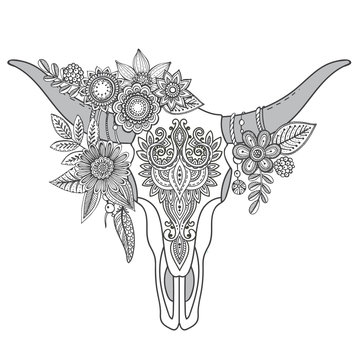 Decorative Indian bull skull with ethnic ornament, flowers and l